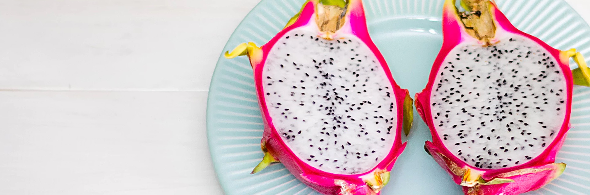 Dragonfruit on a plate cut in half
