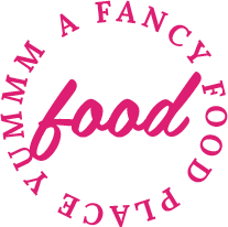 A circle of text saying Yummm a fancy food place, with the word food in the middle